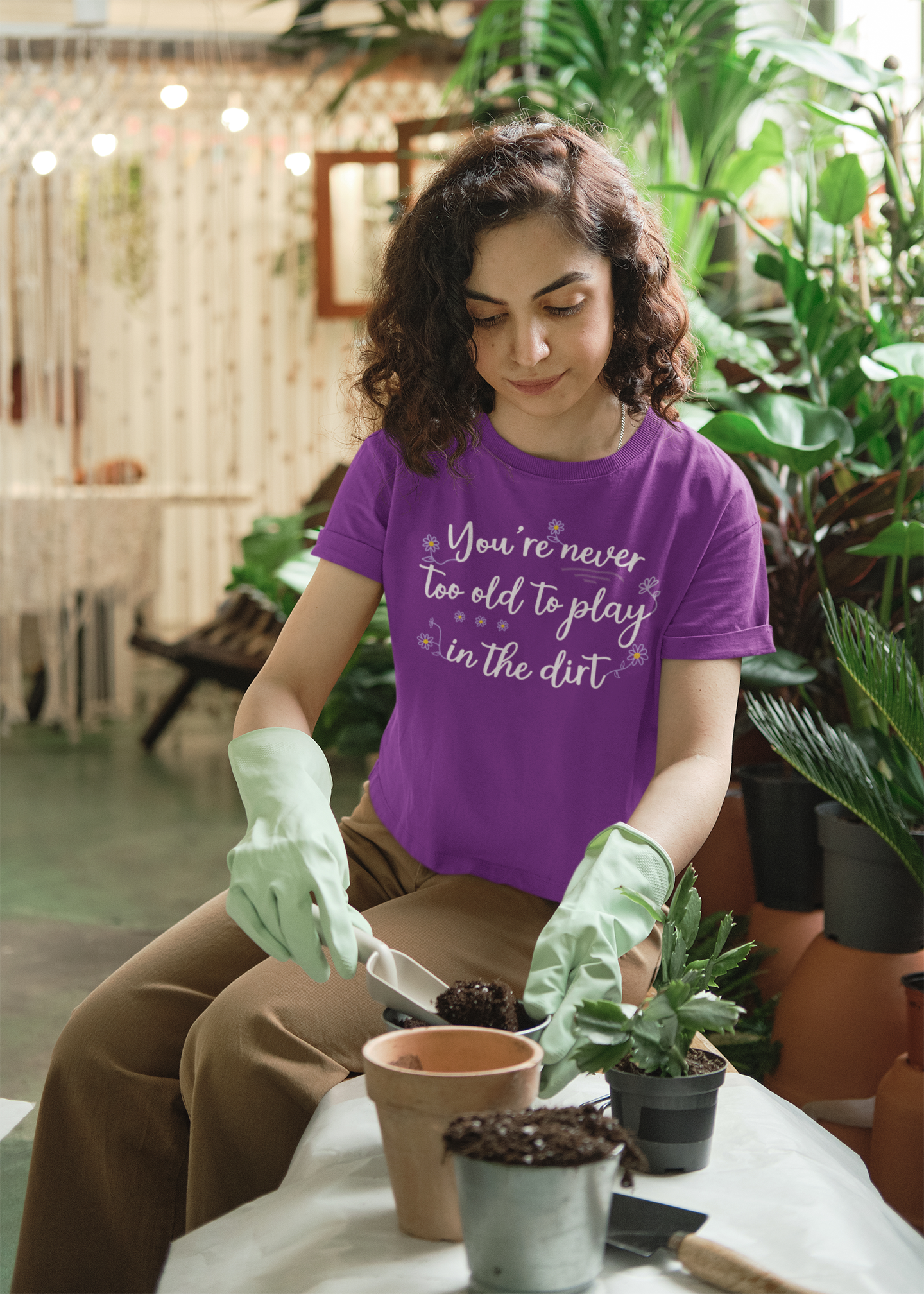 It's Never Too Old To Play In The Dirt Unisex Jersey Short Sleeve V-Neck Tee.